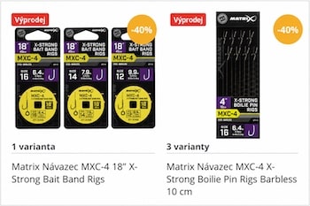 Two Matrix MXC-4 fishing rig packs: left shows 18" X-Strong Bait Band Rigs, right shows 10 cm Boilie Pin Rigs (Barbless), each with yellow labels and a 40% off orange sale badge on the packaging.