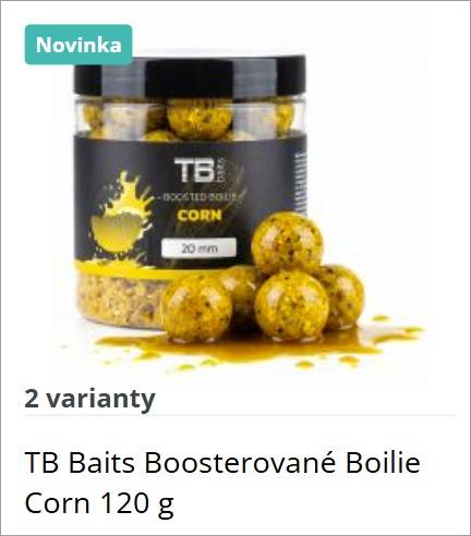 New TB Baits corn boilies jar with several yellow corn-flavored boilies spilled nearby, on white background.