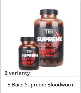 Two TB Baits Supreme Bloodworm bottles (small and large) with black labels showing the 'Supreme Bloodworm' branding for fishing bait.